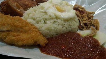 Delicious close-up of a big Nasi Lemak combo