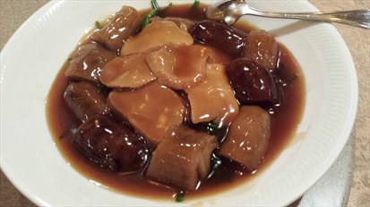 Braised Abalone Mushrooms with Sea Cucumber and Spinach